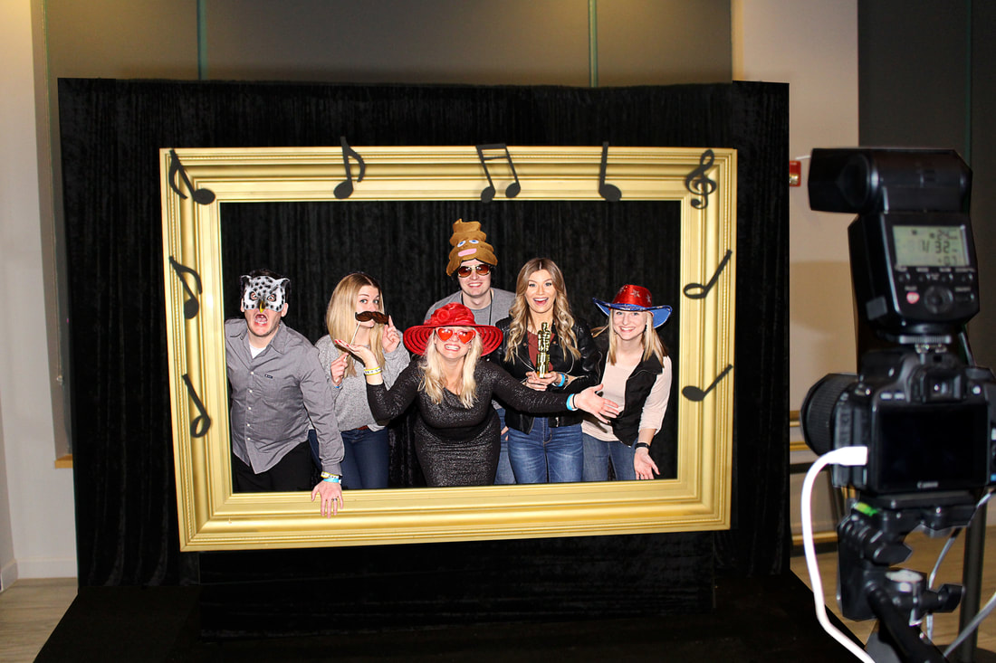 Giant picture frame red carpet photo booth rental.